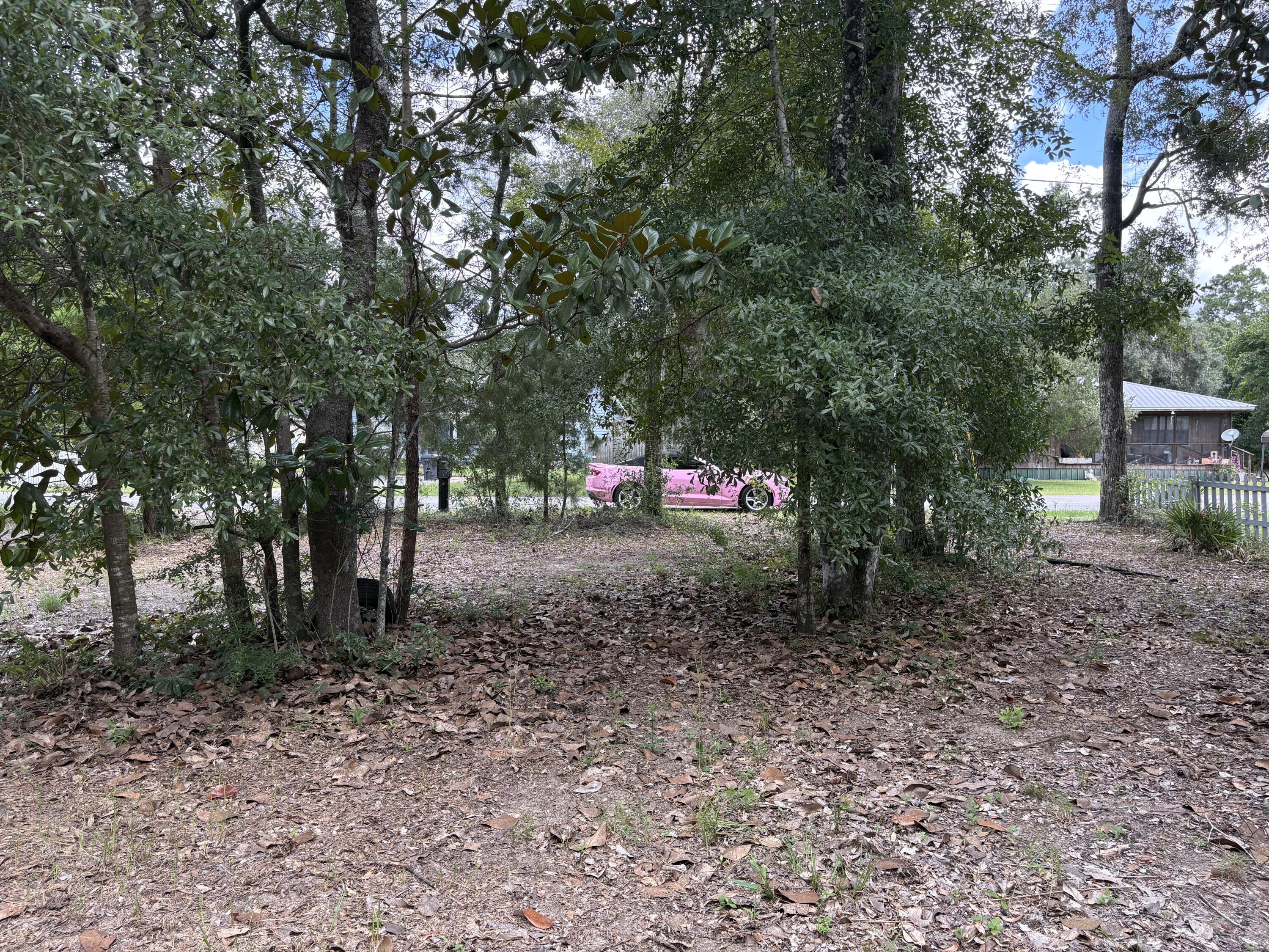 Perfect spot for your new mobile home, Tiny Home, or Single Family Home. All utilities are present. There used to be a mobile home on the lot, which has been removed.