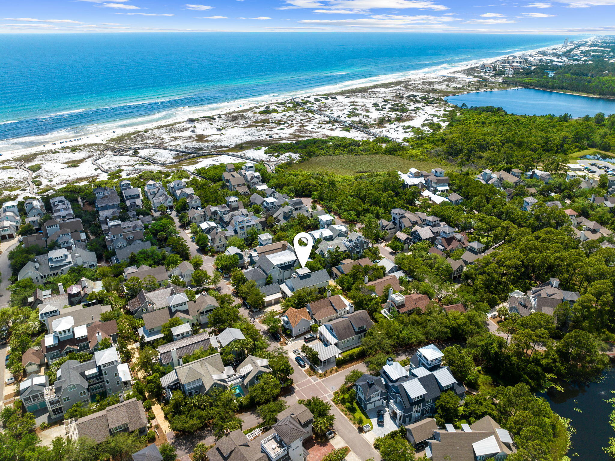 Rare WaterSound Beach opportunity!  Fresh to the market, this tranquil home is located in one of the most desirable enclaves of WaterSound Beach.  It has been recently remodeled from top to bottom including the addition of a secluded courtyard area with a refreshing splash pool which also functions as a relaxing hot tub.  Upon entry, take in the comforting sense of natural light, complemented by tastefully selected interior design elements.  You'll appreciate the solid tile walls that highlight the kitchen and bar area, the quality light fixtures that omit a beachy glow, and the solid hardwood floors that give the entire home an elegant and airy coastal feel.