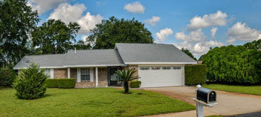 Welcome home to 311 Timberlake Ct. in beautiful Mary Esther Florida! What curb appeal! This 3 bedroom 2 full bath almost 1700 square foot home is move-in ready with many updates. Located on a quiet cul-de-sac street, the lot has plenty of room to enjoy quiet evenings at home or to install a pool. The property backs up to a green space with no homes behind the property. Appliances new in 2017 and totally renovated kitchen. The oven has never been used. High end refrigerator. New granite counter tops and more! High ceilings in the family room and new ceiling fans throughout. New bath and kitchen fixtures, new privacy fence as well. Roof is only 3 years old! New sprinkler system and lawn pump in 2013. Low maintenance with brick finish and vinyl soffits. Gas fireplace in family room.
