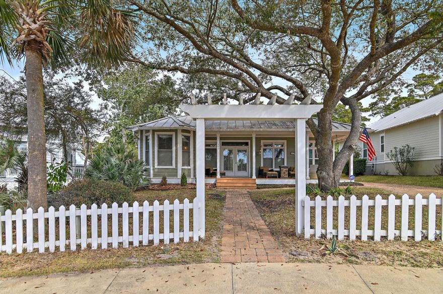 Welcome to your dream beach retreat off  of 30A! Nestled in a serene and peaceful neighborhood, this charming beach cottage is the perfect oasis for those seeking a primary or second home near the beach. Situated just a short stroll away from beach access, this property offers the best of coastal living.  This home comes with a coveted carriage house above a two-car garage for guests or for use as supplemental income. The home backs up to Florida Forestry making for a peaceful and serene back drop.  Only 2,700 feet from home you will be relaxing on the sugar-white sand & clear Emerald Coast waters of one of Florida's Top-Rated Beaches. This fantastic beach home is within a short walking distance or golf cart ride to 1 neighborhood beach access & 2 public beach accesses. Located on the West end of the Scenic 30A corridor, this location is undeniably the most convenient to South Walton County's premier shopping, restaurant districts & amenities, such as Grand Boulevard, Sacred Heart Hospital, Van R Butler Elementary School and a phenomenal state park known as Topsail State Park, which offers guests 1,600 acres of indigenous forest, 3-miles of native, protected beach, and hiking & biking trails.  NEW ROOF AND GUTTERTS STARTING NEXT WEEK!

Sea Dunes exemplifies the quintessential beach vibe that earmarks 30A. Sea Dunes offers low HOA fees with no short-term rentals, 90 day minimum. Please inquire for further details and to schedule a private showing.

Notable features:  New hot tub, ample parking, electronic dog fence, reverse osmosis water system, carriage house, alarm, Jenn-Air refrigerator, new appliances and golf cart!
