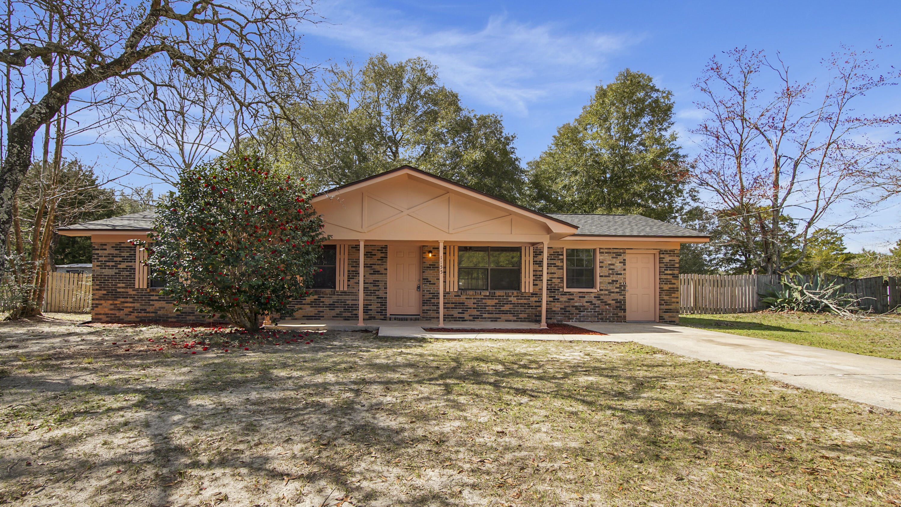 Welcome to your new home! This charming 3-bedroom, 1.5-bathroom residence has been thoughtfully updated and features a versatile bonus room that can serve as a fourth bedroom or cozy den. Relax on the spacious front porch or enjoy the cozy back patio, perfect for gatherings. Inside, you'll discover brand-new flooring, fresh paint, modern light fixtures, and a new roof--everything is move-in ready. Set on half an acre with no HOA, the large, fenced-in backyard offers ample space for outdoor activities and pets. Conveniently located just five minutes from downtown DeFuniak Springs and a short drive from the beautiful beaches of South Walton, this home is a perfect blend of relaxation and recreation. Don't miss your chance to own this updated gem!