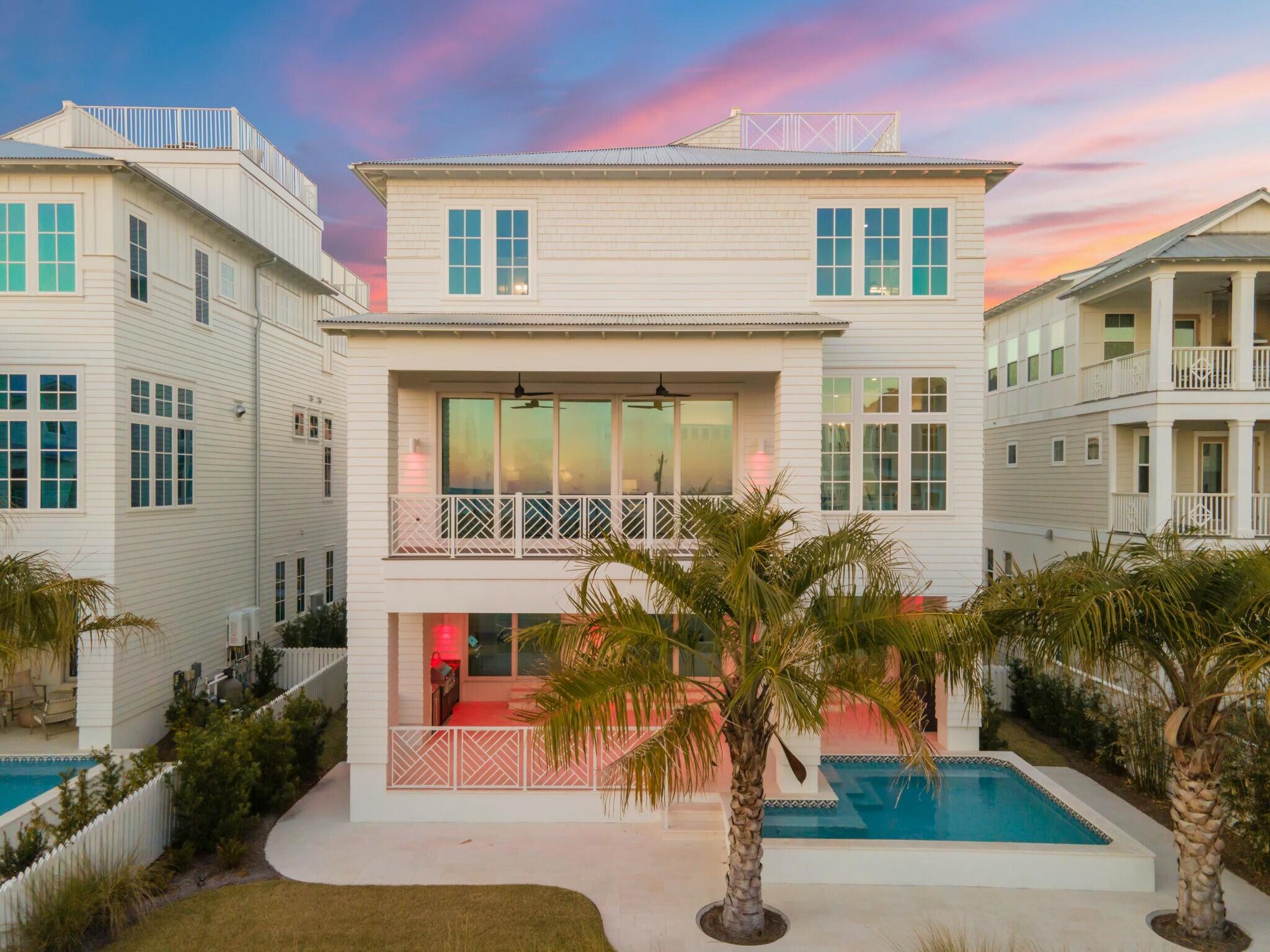This is coastal luxury living at its finest in Inlet Beach. This custom home features breathtaking gulf views and an expansive open layout with elegant finishes and soaring ceilings bathed in natural light. The quality and attention to detail jump out at every obvious and subtle opportunity. The layout is ideal for any family or group gathering. Step outside to enjoy a private pool and a fully-equipped outdoor kitchen, perfect for seamless indoor-outdoor living. Moreover, the home offers easy access straight to the vast, soft sandy beach and emerald waters that make this destination what it is.