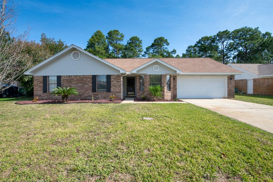 Welcome home!This fully renovated home is tucked away in a quiet community in Mary Esther, just minutes away from Hurlburt Field and Navarre Beach. The quiet neighborhood has sidewalks throughout making it a perfect home for the growing family as well as underground utilities. The home features 3 bedrooms and 2 bathrooms. When you enter, you are greeted with vaulted ceilings and custom epoxy flooring. The kitchen boasts new stainless steel appliances and quartz counter tops. The HVAC and dimensional shingle roof were installed in 2016. Enjoy some of nature's beauty of the Hurlburt Reservation as a backdrop while sitting on your screened in porch and fully fenced backyard. The house is situated on a large lot with endless potential. Call today! This immaculate house will not last long!
