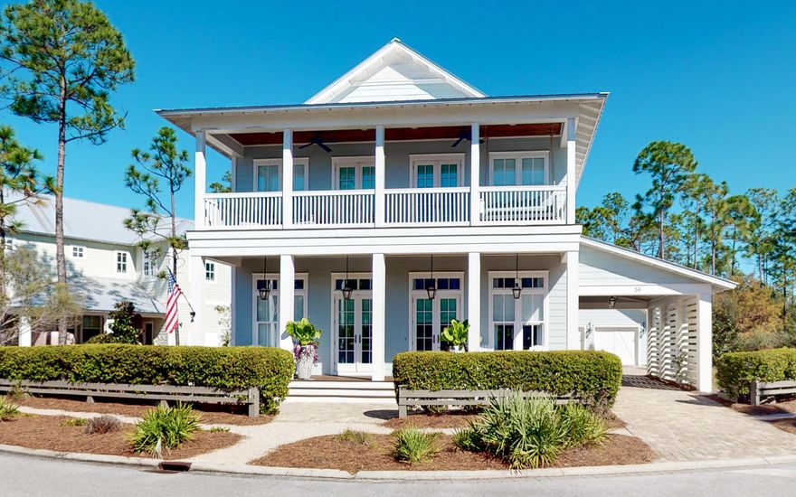 Why would you need to leave home?  This gracious, impeccably detailed 2 story, 5 bedroom home overlooks a tranquil, wooded preserve to add to the privacy of your Watercolor lifestyle.  A long driveway with a porte cochere and  2 car garage provides generous space for a large family visit as well as perfect storage for a Golf Cart.With an expansive Master Bedroom on the first floor,  French doors open to a screened in terrace offering a fireplace and large TV  for outdoor relaxation on cool nights and an outdoor summer kitchen for grilling up championship Bar-B Que.  The Master Bath beckons for total relaxation in an oversized spa shower and soaking tub after a long day at the Beach. Open concept design in the great room will bring everyone together with an indoor fireplace that shares