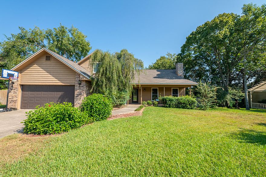 Lakefront 4 bedroom, 3 bath home with a pool. Additional garage with bath could be transformed into an apartment for additional income, mother-in-law suite, or a coveted pool house. This home has a terrific floor plan that flows effortlessly while maintaining the outdoor lifestyle. Relax on your newly replaced dock while enjoying the breezes & nature watching. Binoculars-Plenty of wildlife to keep you entertained. From the comfort of your screened in porch, enjoy views of the lake & your sparkling blue pool. Additionally, the large deck along the back of home makes this the perfect home for entertaining. Master bedroom and one additional bedroom are downstairs. Freshly painted with new white wood trim & interior doors. Pool Pump, HVAC, & roof 2017, Pool Chlorinator 2019.