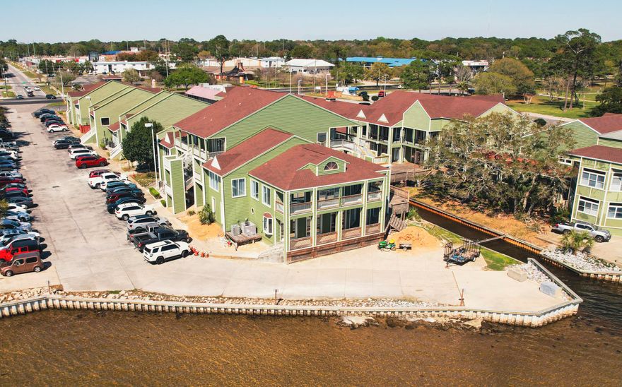 Discover this prime 1,800 SF office space in Fort Walton Beach's Paradise Village Professional Park. Positioned on the south end of the complex, this first-floor space offers stunning views of Santa Rosa Sound. The floor plan offers four private offices, a spacious meeting area, a well-equipped kitchenette, and three restrooms (two with showers). Fronting Hwy 98, the complex offers a diverse tenant mix including healthcare, financial, real estate, spa, and defense services. On-site amenities include ample parking, and a small canal running through the complex with communal sitting areas for some fresh air and shade. Hurlburt Field, Eglin AFB, and Destin-Fort Walton Beach (VPS) Airport are approximately 5 miles, 9 miles, and 11 miles, respectively, from your future office location.