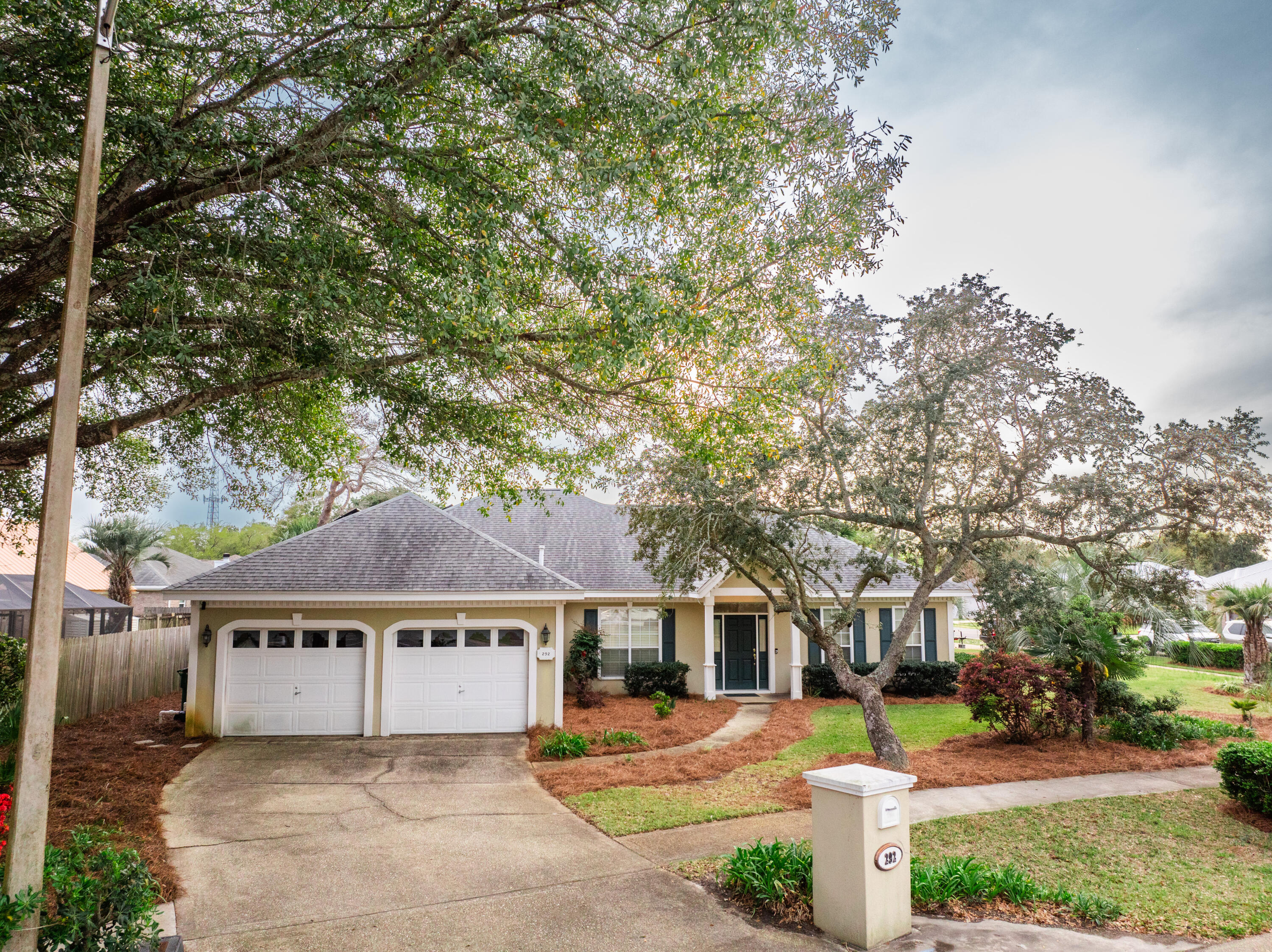 Introducing 292 Stahlman Ave! With its location in the heart of Destin, this charming, well-maintained 3BR/2BA home offers the perfect blend of convenience and coastal charm. Enjoy the best of Destin living, located just minutes from the Destin Harbor and HarborWalk Village with its access to world-class fishing and boating, restaurants, shops, and entertainment options. Boaters are sure to appreciate the proximity to Joe's Bayou boat launch as well. Situated on a spacious and beautifully landscaped lot, 292 Stahlman has been well cared for and offers both comfort and efficiency. **NEW ROOF coming soon! Buyer is also replacing hot water heater and air handler! Inside, the open floor plan creates a bright and inviting living space. This plan offers a private and spacious master suite, with its own exterior door. The two additional bedrooms and bath are thoughtfully positioned on the opposite side of the house. The clean and well maintained interior includes space for dining, breakfast nook, and spacious kitchen.  The back porch area is loaded with opportunity, offering the perfect space to create your own outdoor private retreat. A spacious two car garage with a mini split system offers versatility, making it ideal for a workshop or home gym. 

Please note that short term rentals are prohibited in this established residential neighborhood of Ridge Wood Manor.  No HOA.

Don't miss this opportunity to own a piece of paradise! 