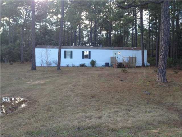 Great opportunity for a newer home on an acre of land in West Navarre. Quiet dead-end street means less traffic to interrupt family activities. Newer A/C unit blows very cold, fresh paint throughout. Durable flooring throughout. Many, many large mature trees in expansive yard.