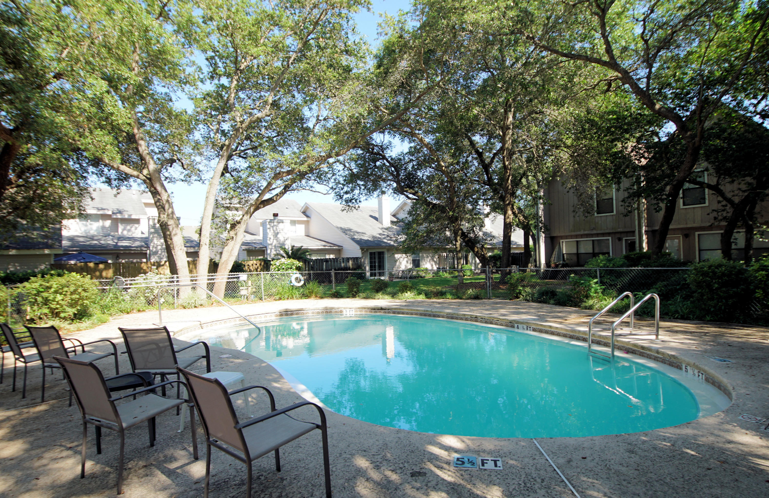 Beautiful Hidden Gem in the Middle of Ft Walton Beach. Do You Commute to Eglin AFB or Hurlburt Field? What a breeze! This well kept unit shows beautifully. You enter into what could be a Dining Room or an separate Living space/Office area. The kitchen is accessed from there as well as the hallway leading to the Living Area. Open Roomy Kitchen with loads of space and storage! Half Bath downstairs for convenience as well as the Laundry Room. There are 2 HUGE Bedrooms and they each have their own Bathroom! Bedrooms. The grounds are gorgeous and there is a Community Pool that's right outside the back door. 2 assigned Parking Spaces at the Front Door. Easy Living! Close to Shopping, Food and the Beaches. Call Today.Buyer to verify all measurements.