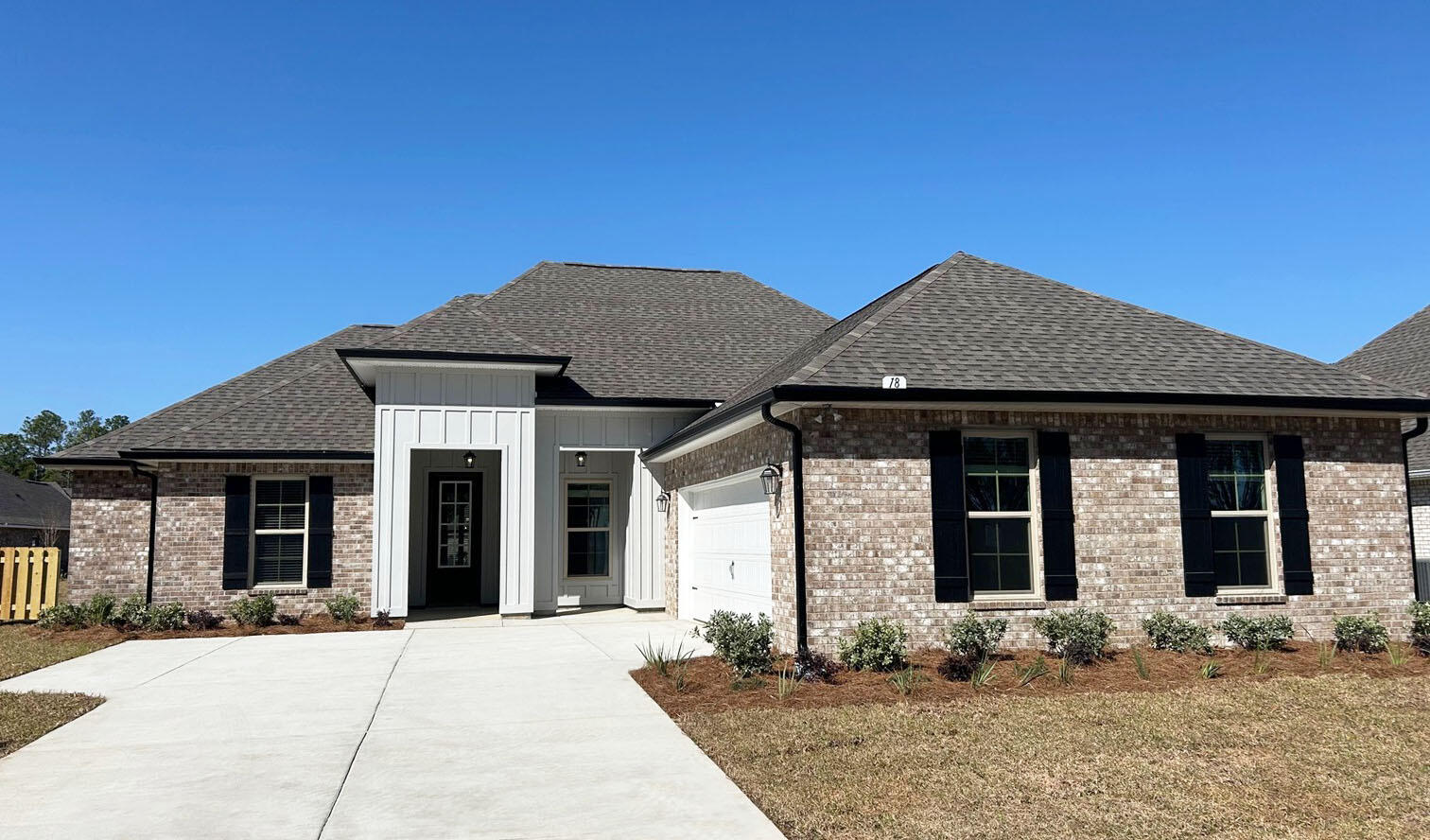Awesome builder rate plus FREE front gutters. Restrictions apply.The KLEIN III H in Bird Song at Hammock Bay community offers a 4 bedroom, 3 full bathroom, open design. Upgrades added (list attached). Features: double vanity, garden tub, separate custom tiled shower, and walk-in closet in master bath, tray ceiling in master bed, kitchen island, walk-in pantry, boot bench in mudroom, recessed lighting, crown molding, framed mirrors, smart connect WIFI thermostat, smoke/carbon monoxide detectors, landscaping package, architectural 30-year shingles, flood lights, and more!Energy Efficient Features: water heater, electric kitchen appliance package, vinyl low E windows, & more! Energy Star Partner.