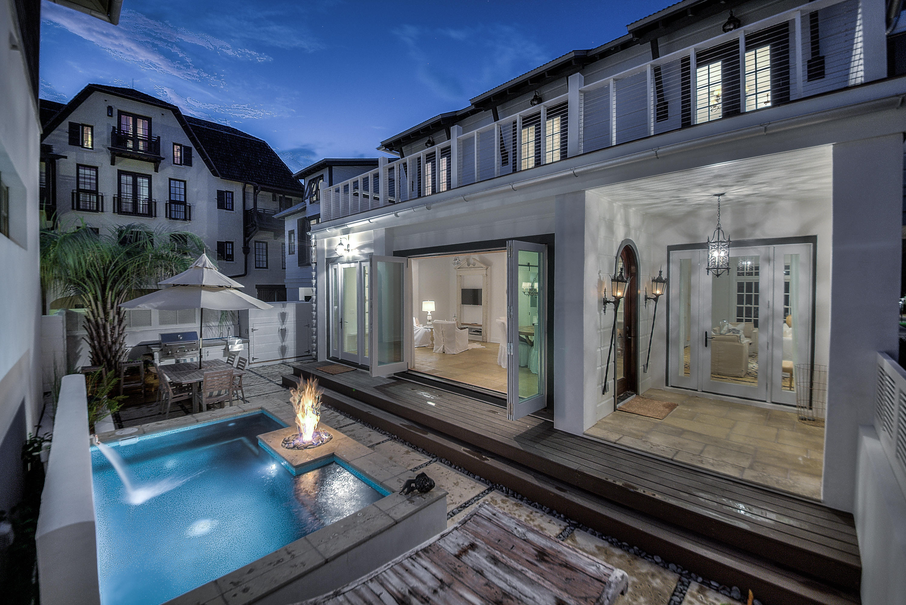 MILLION DOLLAR RENOVATION for this GULF SIDE luxury beach residence. The perfect trifecta of style, convenience and privacy! This 5 bedroom 4.5 bathroom Rosemary Beach stunner has everything you need for coastal living. A sleek courtyard offers a private pool and outdoor kitchen. Retractable glass doors expand the spacious chef's kitchen extending the ability to entertain out into the secluded courtyard. The open yet intimate layout of the main home merges metropolitan design with beach charm. A separate carriage house evokes the drama of a stately uptown loft completing this ultimate beach retreat, both elegantly furnished with no detail left unattended. Sold Fully Furnished with Gross Rental Projections of $178K annually. Home completed in 2016 and available for private viewing.