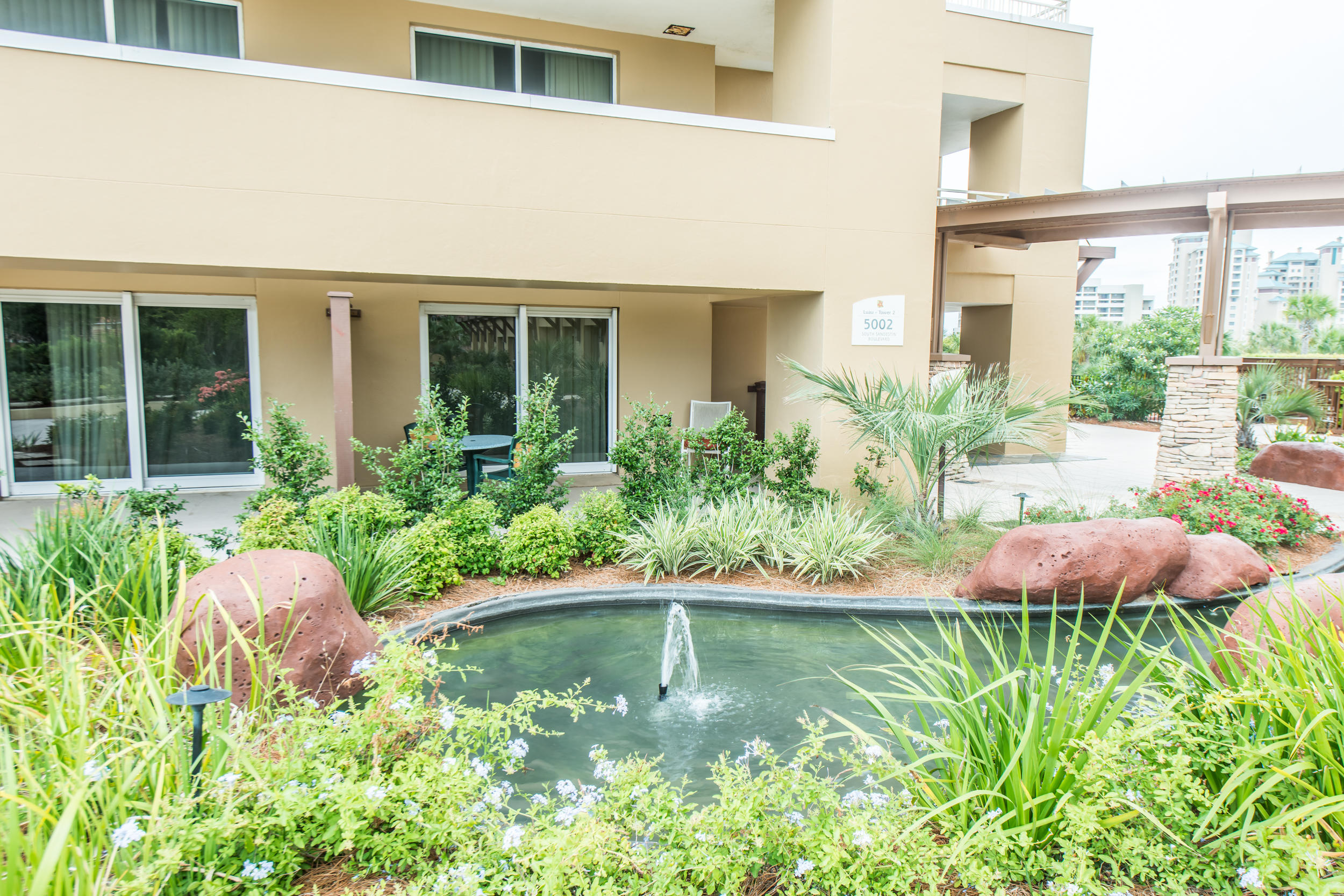 A large walk out patio offers easy access to the heated saltwater pool and barbecue grills from this ground floor studio in Luau II. This studio is fully furnished and equipped, including a king size bed with new mattress, new queen size sleeper sofa, dinette table and chairs, new TV and DVD player, refrigerator, microwave, coffee maker and a full bathroom. Luau offers exceptional amenities for you and your guests to enjoy; such as a lagoon style pool with a swim-under waterfall, a fitness center, outdoor gas grills, rooftop observation deck, and easy beach access.