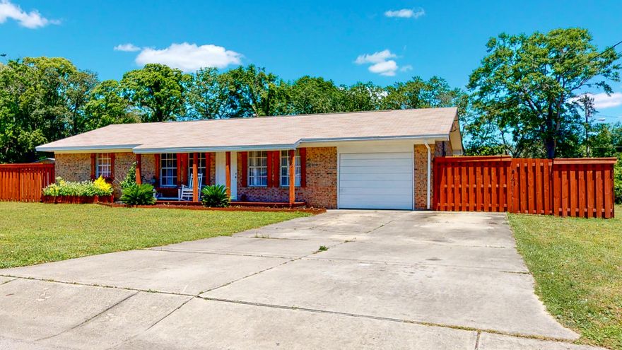 Get ready to fall in love with this single story, 3 bedroom, 2 bath ranch style home. Centrally located in Fort Walton Beach, near Eglin AFB, Hurlburt Field, Restaurants, Shopping and the beach! The owners have done a tremendous job on the kitchen remodel with new butcher block counter tops, farm sink, subway backsplash, and new stainless steel appliances with a gas stove. They didn't stop there-- they continued the kitchen outdoors with a new outdoor kitchen! Open deck with custom seating, fenced in back yard on a corner lot. This is a home you don't want to miss!