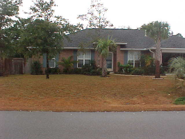 Come see this well kept home located South of I-10 w/ nicely landscaped yard, privacy fenced, 2 car garage w/opener, large screen room, fireplace, plant shelves, island in kitchen, and more. Call today to set up showing! Owner will consider one small pet only.