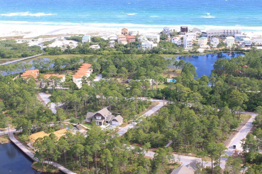 Beautiful Gulf Front lot located in the quaint gated community of Seclusion Dunes. This lot over looks Deer Lake State Park, a 2,000 acre gulf front preserve, with rolling white sand dunes as far as your eye can see. This large lot will accommodate a home, carriage house and a good sized pool. The possibilities are endless. This is a must see.
