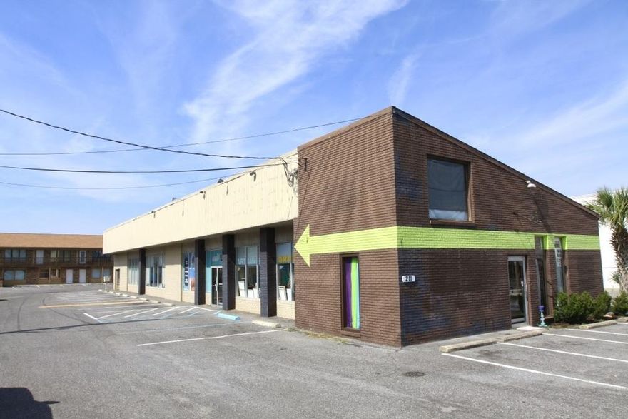 Available for purchase- 14,600sf of mixed use income producing property in Destin FL with tremendous upside. This property consists of two 7,000sf (+/-) buildings with 10 units on .76 acres. Building 1 is a 7,000sf former furniture store with 4500sf of showroom and 2500sf of warehouse currently leased as two separate units. Building 2 is a 7,600sf two story brick building with 8 units (1 apartment, 6 retail / office units and 1 workshop). Current gross income is $83,580 with 90% occupancy and rental rates are well below the current market, proposed rate structure should produce net rents in excess of $110k annually, with estimated operating expenses of $2.29 per sf.Centrally Located, New Roof 2018.