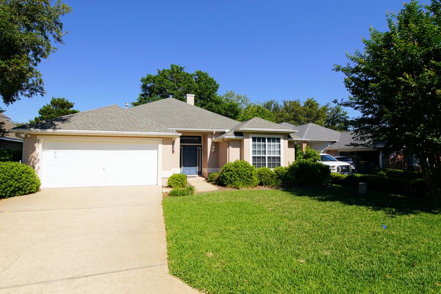 This Charming, One Owner Bob Fisher Signature Custom built 3 Bedroom 2 Bathroom home on the 8th/Eighth hole of beautiful Shalimar Pointe Golf Course, a gated community located just a few minutes to the East gate of Eglin AFB. This Home is move-in ready. Excellent floor plan, Wood laminate Flooring throughout the Living Room with Crown Molding, custom Built In Book Cases and cabinets either side of the Fireplace which leads outside thru Sliding Glass Door to enclosed Florida Sun Room. Ceiling Fans through out this home. Kitchen has Natural Wood Cabinetry, Corian Counter Tops, Breakfast Bar. Dining Area. Laundry Area New Water Heater in 2015. New Dimensional Shingle Roof installed in 2012. This home is perfect just needs NEW OWNER!Schedule your private showing now!