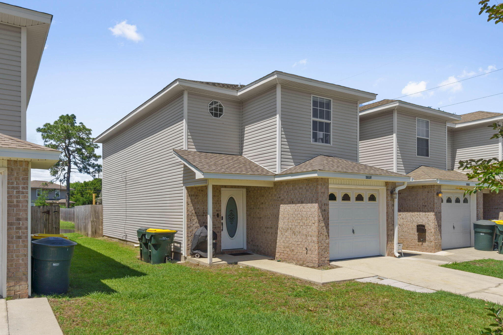 Beautiful, end unit 2 bedroom 2.5 bathroom townhouse with 1-car garage in central Fort Walton Beach. This home has been meticulously kept by the current owners. The beautiful warm tones flow throughout the entire home. The open feel from the kitchen to living room provide you a the perfect entertaining space. One of the best parts of this home is the two primary bedrooms upstairs! Each bedroom has a private ensuite and fantastic for privacy. The private backyard is fully fenced with a patio! Another great thing about this home is the centralized location. Hurlburt, eglin, and shopping are within just a few miles! Come see this move in ready, spacious, and conveniently located townhome in Fort Walton Beach!