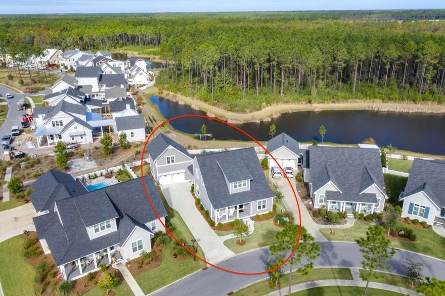 Meticulously maintained and beautifully designed Custom Home. Situated on the bend of a serene pond in the back and a community park in the front in a construction complete area of Origins, this is truly an incredible opportunity to own the quintessential Florida home. When you first walk in, you will immediately notice the ten foot ceilings, how bright, welcoming and eloquent this home really is. Every detail was obsessed over and the list of upgrades is longer than a summer night. In the master, you'll revel in the morning light as it soaks into the shiplap accent wall and pours into the gorgeous quartz floors and countertops of the master bathroom. Featuring upgraded Honeycomb marble flooring in the shower, quartz walls, a garden tub, dual vanity and an expansive walk-in closet. Across the hall in the guest bedroom, there is again a shiplap accent wall, an upgraded which has been implemented throughout the entire home. Upgraded basket weave tile in the showers as well as upgraded bathroom flooring, quartz countertops and Koehler toilets and sinks. In the main area of the home you're first greeted by a proper dining area and an expansive living area. In the kitchen there is upgraded cabinetry to the ceiling, quartz countertops, Thermador stove and dishwasher, Subzero fridge and Sharp drawer microwave. Upstairs there is an easterly facing bonus room or office space with two additional bedrooms with ensuite bathrooms on either side. However, if you're looking for somewhere more secluded for your guests, take a trip back downstairs, past the kitchen and laundry room and up the stairs to the carriage house. A private and self sustainable location with a full bath. You will also see a magnificent quartz wet bar with a built-in wine cooler. Out back, there is a large screened-in patio overlooking the pond with a stone BBQ area and a completely fenced in backyard. With a 2 car garage, ample driveway space, 5 bed, 5 bath and an unparalleled location, this is the ideal home for entertaining, big families or those who just simply love their space.

Watersound Origins homeowners are able to access the fitness center and seasonally heated community pool, as well as dock access at neighboring Lake Powell. Watersound Origins also connects to the Panama City Beach Conservation Park via a 5-mile long trail. Watersound Origins offers plenty of options for the nature and beach lovers alike! Spend your days kayaking, paddle boarding, biking, running or walking along the Watersound trail. Located a short distance from Scenic Highway 30A there are endless dining, event and local shopping options and attractions.

Owners in WaterSound Origins may also have the opportunity to join the St. Joe Beach Club featuring private beach access, beach services, 2 pools, 2 restaurants and a bar with gulf views along with 2 private Golf Courses, Camp Creek Golf Course and Sharks Tooth Golf Course. Please inquire with membership for more info and latest offerings.