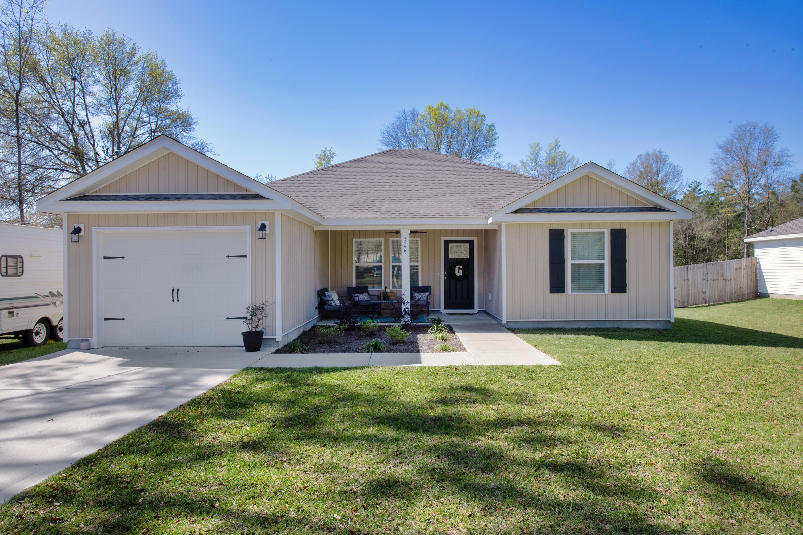 Welcome to this beautiful 3-bedroom, 2-bathroom Craftsman-style home in Northern Crestview, FL. With no flood insurance required and no HOA fees, this home offers both peace of mind and convenience. Assumable VA loan at 6%! Enjoy the open-concept floor plan, high vaulted ceilings, and modern finishes including quartz countertops, luxury vinyl plank flooring, shaker cabinets, and stainless steel appliances. The master bathroom features dual vanities for added comfort. Relax on the covered front porch and take advantage of the large backyard, perfect for outdoor activities. Located in a quiet neighborhood with great neighbors, this home is less than an hour from the beach and includes a 30 amp connection outside.