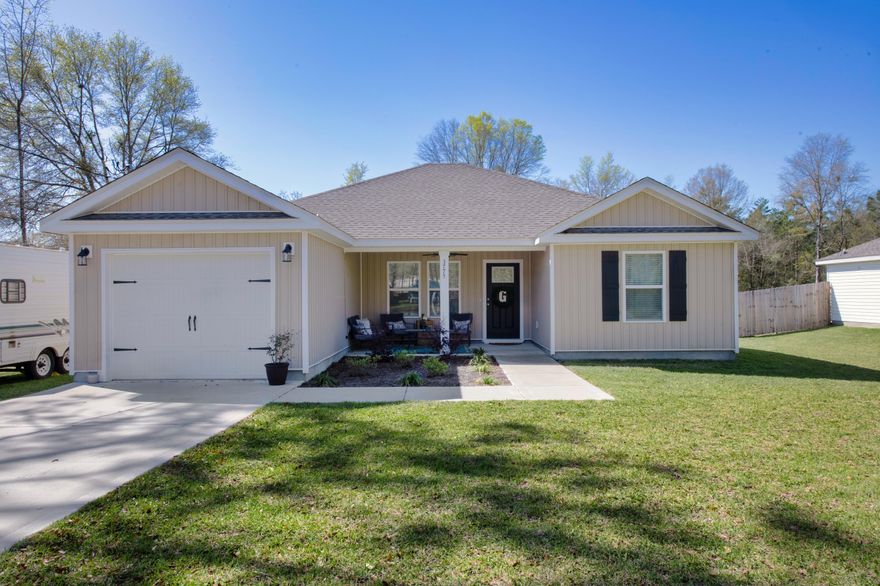 Welcome to this beautiful 3-bedroom, 2-bathroom Craftsman-style home in Northern Crestview, FL. With no flood insurance required and no HOA fees, this home offers both peace of mind and convenience. Assumable VA loan at 6%! Enjoy the open-concept floor plan, high vaulted ceilings, and modern finishes including quartz countertops, luxury vinyl plank flooring, shaker cabinets, and stainless steel appliances. The master bathroom features dual vanities for added comfort. Relax on the covered front porch and take advantage of the large backyard, perfect for outdoor activities. Located in a quiet neighborhood with great neighbors, this home is less than an hour from the beach and includes a 30 amp connection outside.