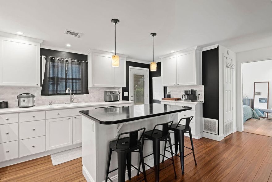 This inviting cottage blends character, comfort, and untapped potential--perfectly positioned near local military bases, Niceville, and Fort Walton Beach. A welcoming screened front porch, a spacious kitchen with custom cabinetry and Corian countertops. The bathroom has dual vanities in the primary suite with private backyard access. The den flows into the dining area and the kitchen, creating a warm, functional layout. Outside, enjoy a true fenced in backyard retreat! With a sparkling pool, two storage sheds, a deck, and a pergol it's perfect for entertaining.  Excellent location, this home is a must-see!  CALL TODAY