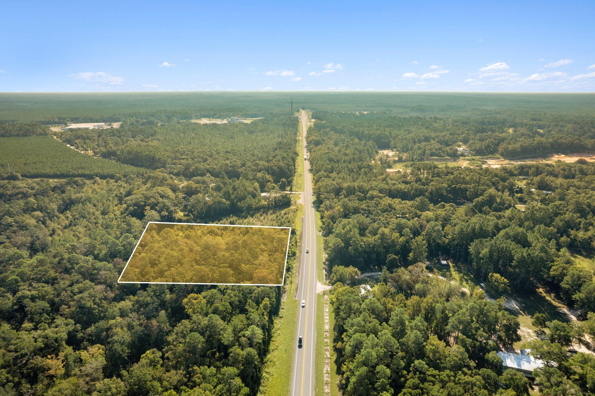 UNDER CONTRACT WITH 72 HOUR KICK OUT CLAUSE IN PLACE. ACCEPTING BACK UP OFFERS.ONE ACRE located 3/4 of a mile from Cowford Boat Launch on the Choctawhatchee River! The lot is also 3/4 of a mile from the crossing of highway 20 and highway 79, giving easy access from Panama City or Freeport. Lot has approximately 200 feet of highway 20 frontage. Bring your boat and your house plans, or consider a rezone to commercial and explore the possibilities.