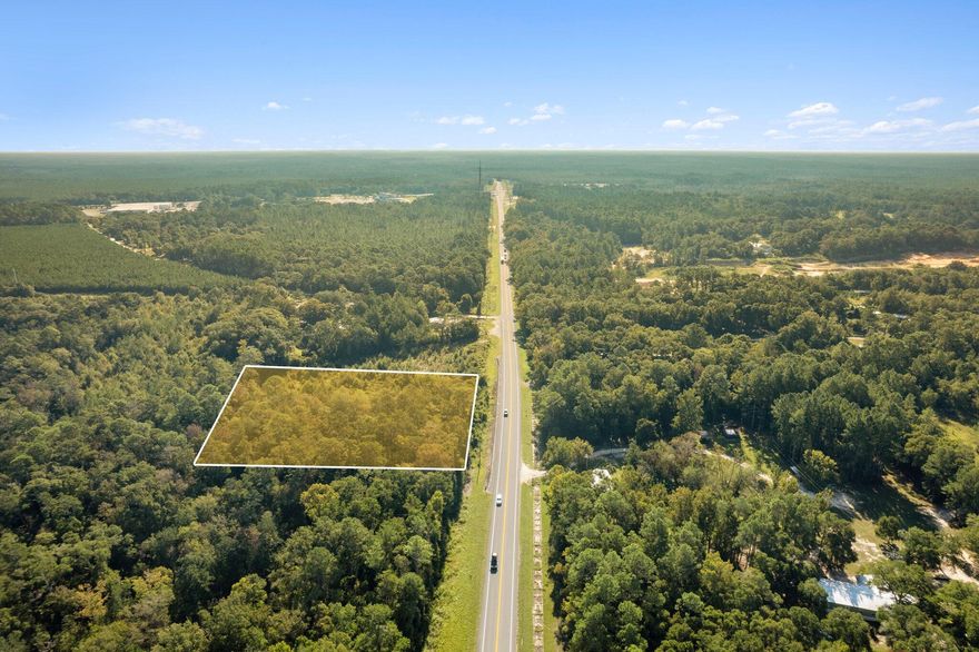 UNDER CONTRACT WITH 72 HOUR KICK OUT CLAUSE IN PLACE.  ACCEPTING BACK UP OFFERS.ONE ACRE located 3/4 of a mile from Cowford Boat Launch on the Choctawhatchee River! The lot is also 3/4 of a mile from the crossing of highway 20 and highway 79, giving easy access from Panama City or Freeport. Lot has approximately 200 feet of highway 20 frontage. Bring your boat and your house plans, or consider a rezone to commercial and explore the possibilities.
