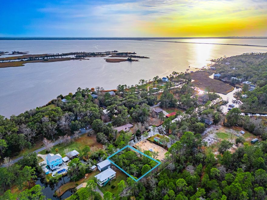 This WATERFRONT property offers a rare opportunity to build your dream home in a peaceful and private setting with no HOA restrictions. Located along a canal with direct access to the Choctawhatchee Bay, these lots are perfect for creating a tranquil retreat. This property offers canal frontage & provides space for your custom development.Sewer lines are conveniently located on Wilson Way.  Many of the neighboring properties feature boats docks along the canal.The surrounding neighborhood is seeing new, high-quality homes being built, making this an excellent investment for both homeowners and builders. Whether you're looking to enjoy waterfront living, with easy boat access or a quiet, scenic location this property offers an incredible opportunity.