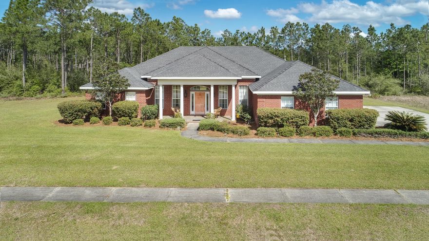 MUST SEE HOME!! This beautiful estate size property is located in the charming gated community of Windswept Estates, situated directly on Fairway #13 of a 4 star golf course as rated by Golf Digest. The community is located just a little over 5 miles to the new Publix shopping center in Freeport and roughly 35 minutes from the new Northwest Florida Beaches International Airport and 25 minutes to the Bay, 35 minutes to the nearest beach access in Blue Mountain. This gracious retreat features a split floor plan, granite countertops, a beautifully landscaped yard, office, back patio, a spacious master suite, formal dining room, 3 car garage, tall ceilings and big laundry room all while providing ample privacy to create the perfect oasis.