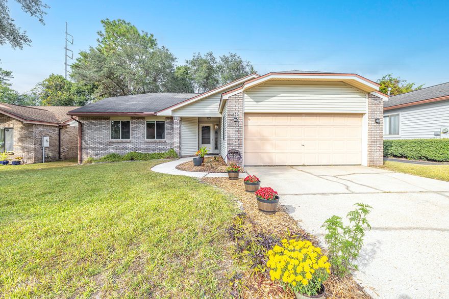 A Move In Ready Home, 3 bedroom, 2 baths, 2 car garage . NO HOA!  This home has the perfect open layout with elevated ceilings and a beautiful fireplace in the spacious Livingroom. Features: Updated kitchen, new counter tops/backsplash, stainless steel appliances, refrigerator, gas range/stove/broiler, dishwasher (no microwave), New wood cabinets- countertops in bathrooms, Pet grade screen in patio, fenced in back yard, 3/4 of fence is new, new frame/rollers - sliding glass door, fresh spray insulation in attic, large format rustic wood-look porcelain tile/Vinyl.Sprinkler system conveys ASIS disconnect.HVAC 5 , Roof 17 , Water heater age unknown due to cover.15Mins to Eglin AFB, 20- Mins To Destin Beaches. Buyer to verify all dates, measurements and anything deemed important