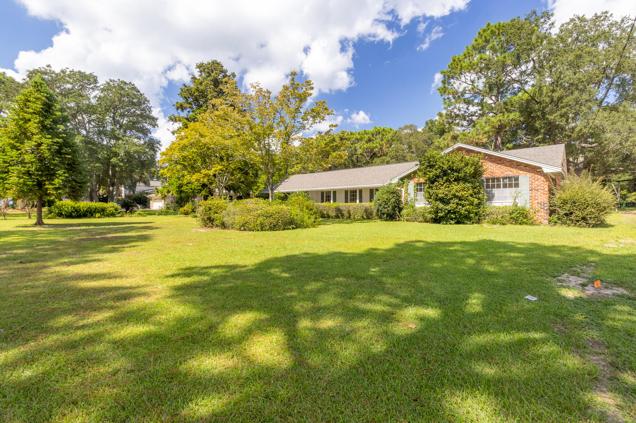 Come see this classic ranch style home in Lake Lorraine! A very, rare hidden gem in Shalimar. It is an excellent neighborhood surrounded by a wonderful community and schools within walking distance or a short bike ride. This unique property sits on 3/4 of an Acre. Roof and electrical wiring replacements and upgrades in 2023. AC and water heaters replaced in 2021. Easy to pass 4-point inspection. No HOAs!