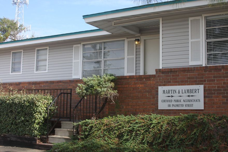 2400 Sq/Ft office building with 4 separate entrances was originally built as a tri-plex in 1973.  It could possibly be converted into 3 or 4 offices.  Situated on the corner of Mountain Dr and Palmetto St, it sits one block off of HWY 98 in the Harbor District.  Plenty of parking and a carport.  ZONING is Commercial Trades and Services.  OR knock the whole thing down and PUT UP A PARKING LOT!  Buyer to verify allowable uses, dimensions.