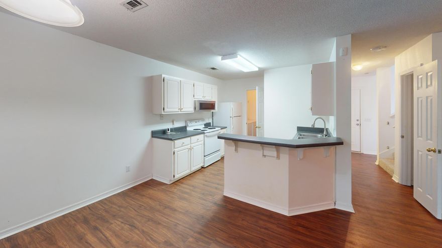 Beautiful home with NEW roof. Low maintenance yard in a prime location! This home features an indoor laundry, freshly painted and new carpet 2-car garage, and 2 and a half bathrooms. House has been coverted to a tank less water heater. Call today for showing