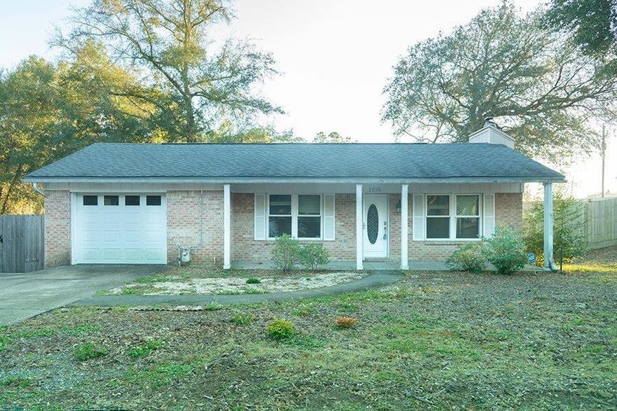 This updated, spacious home with huge backyard is ideally located in the heart of Niceville. Close to many shops and restaurants, and the street is one of the closest in the neighborhood to Hwy 20. Featuring a large living room with a wood-burning fireplace and vaulted ceiling. The remodeled kitchen is bright and open, boasting new stainless steel appliances, granite and plenty of cabinets and counter space.  Screened in porch that overlooks a beautiful large fenced-in backyard. Large master bedroom with double vanities in master bathroom.