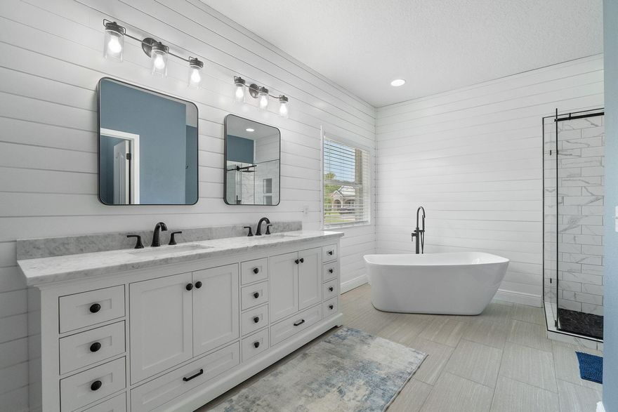 Tucked away behind lush greenery and mature trees, this newly remodeled modern brick home offers the perfect blend of privacy and luxury, right on the golf course. Natural light pours through oversized windows, illuminating every corner of the open, airy floorplan. Step outside and you're just a few strides from the manicured fairway--ideal for morning walks or an impromptu game of golf. A private side-entry driveway welcomes you home, offering both convenience and curb appeal. Inside, every detail has been thoughtfully curated, from the sleek finishes to the stunningly remodeled bathrooms. Unwind in the spa-inspired owner's suite, where a freestanding soaker tub and a glass-enclosed walk-in shower promise pure relaxation.Best of all, you're just minutes from the white sandy beaches, vibrant shopping districts, and fine dining. The community's low HOA fees unlock a world of resort-style amenities: tennis courts, a fully equipped fitness center, soothing sauna and steam rooms, a private boat launch, and so much more.

There are five full bedrooms with closets, and the fifth one would be a great office space. The home also includes two living rooms. One features the fireplace overlooking the golf course. This would make an amazing den and relax space in the evenings. 

This isn't just a homeit's a lifestyle.
