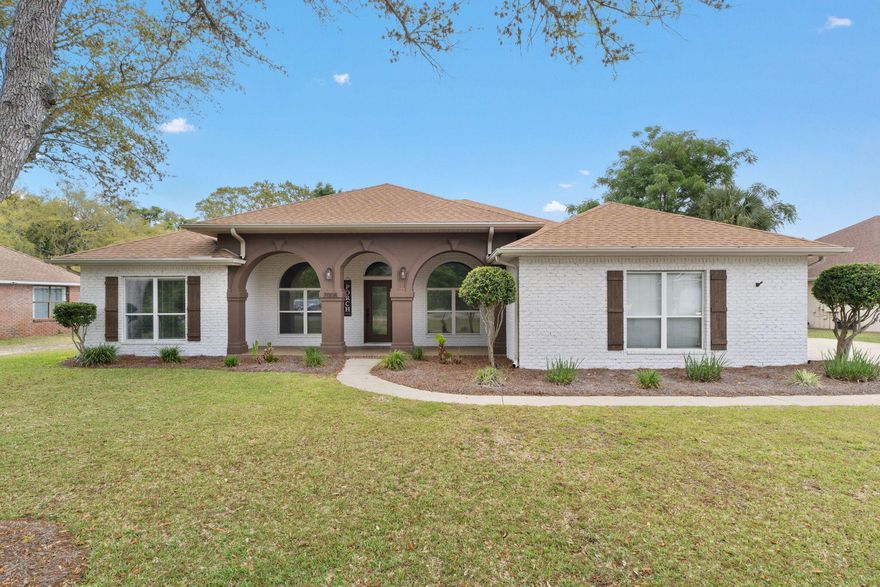 Tucked away behind lush greenery and mature trees, this newly remodeled modern brick home offers the perfect blend of privacy and luxury, right on the golf course. Natural light pours through oversized windows, illuminating every corner of the open, airy floorplan. Step outside and you're just a few strides from the manicured fairway--ideal for morning walks or an impromptu game of golf. A private side-entry driveway welcomes you home, offering both convenience and curb appeal. Inside, every detail has been thoughtfully curated, from the sleek finishes to the stunningly remodeled bathrooms. Unwind in the spa-inspired owner's suite, where a freestanding soaker tub and a glass-enclosed walk-in shower promise pure relaxation.Best of all, you're just minutes from the white sandy beaches, vibrant shopping districts, and fine dining. The community's low HOA fees unlock a world of resort-style amenities: tennis courts, a fully equipped fitness center, soothing sauna and steam rooms, a private boat launch, and so much more.

There are five full bedrooms with closets, and the fifth one would be a great office space. The home also includes two living rooms. One features the fireplace overlooking the golf course. This would make an amazing den and relax space in the evenings. 

This isn't just a homeit's a lifestyle.
