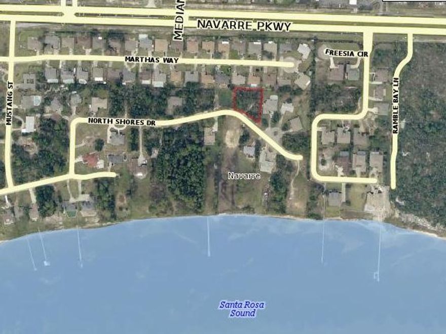 Nestled in a nice and cozy community with elegant homes. This beautiful and large lot offers excellent elevation and is in flood zone X and therefore does not require flood insurance. The southern exposure offers views of the Inter Coastal Waterway.Easy access to the Santa Rosa Sound and nearby Navarre Beach. Build a comfortable home in a tranquil and private environment only minutes from Navarre beach and Pensacola. Excellent for family life and retirement. Close to every convenience.