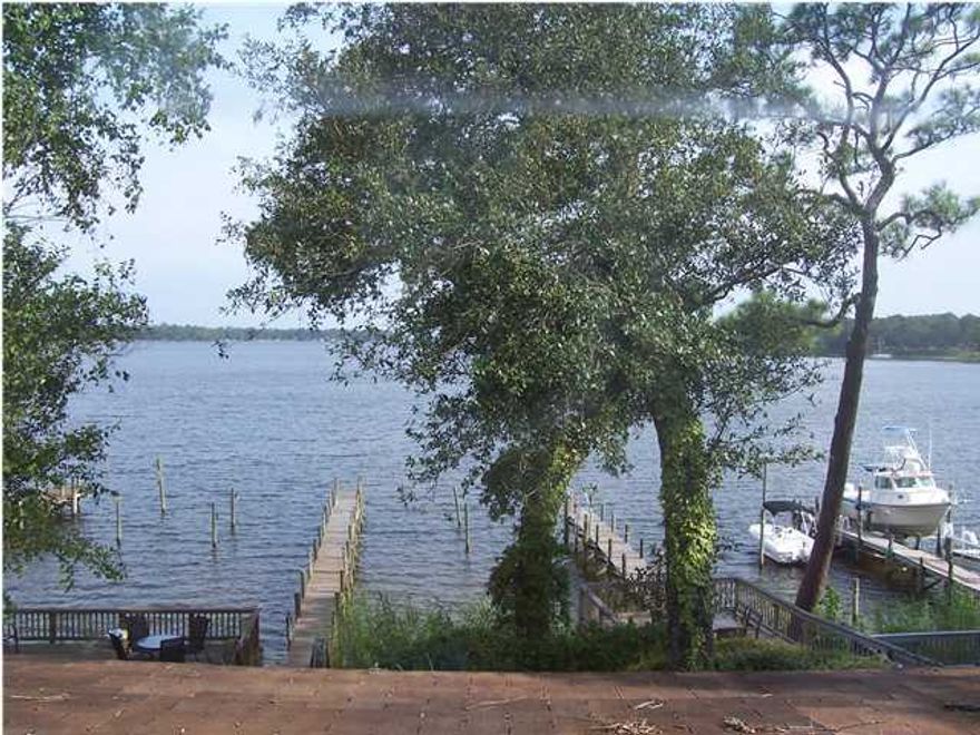 ***Waterfront*** panoramic view of bayou and pass to bay. Enclosed porch, tiled kitchen, porch, downstairs bath & foyer. Built-in book shelves & entertainment center. Watch magnificent sunsets and dolphins play. Sail away to Destin in minutes. Owner will consider small pet with $255 non-refundable pet fee. Sorry NO CATS. NO SMOKING!
****Reminder: Everyone 18 or over planning to live in the house must fill out an application.