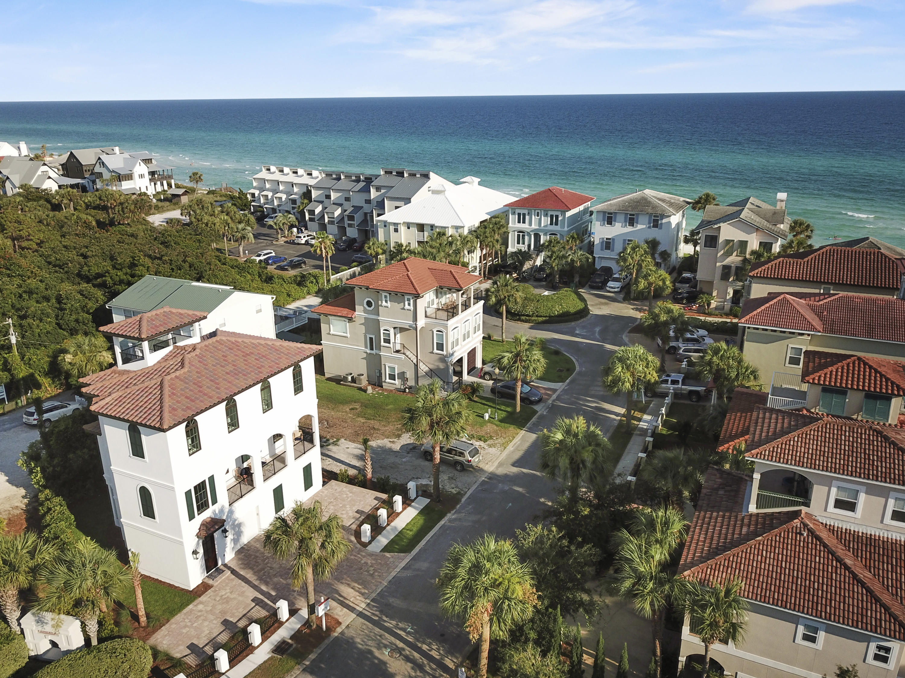 Brand new gorgeous Spanish Coastal style beach house with gulf views offered fully furnished and turn key ready with rental projections at $129,000. This 4 bedroom 4.5 bathroom, all en suites, located south of 30a, close to all the restaurants and shopping in Blue Mountain Beach. Just a few steps to private gated deeded neighborhood beach access, Gulf views, elevator, great neighborhood pool, designer lighting, 2 laundry rooms, mud room with built in bench and hooks, kitchenette area with beverage center, microwave and TV room off bunk room on first floor. Hardwood and stone floors, Viking cooking appliances, 4 exterior porches, professional interior design by Eiland & Rice Interiors, custom window treatments, bleached pecky cypress and shiplap walls throughout the home. This