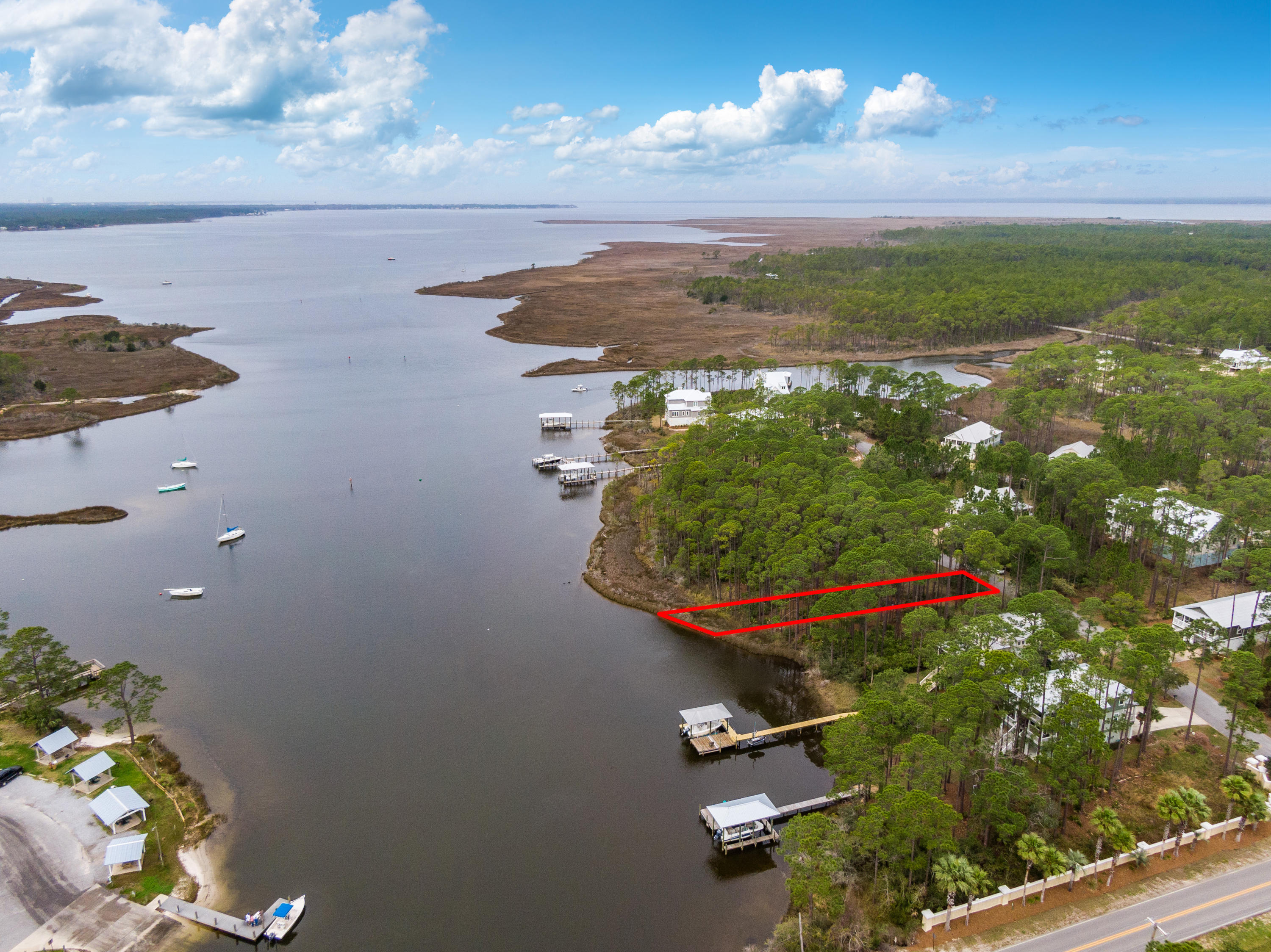 Build your dream home and dock on a tucked away quiet street within the gated community of Cessna Landing. This bayou front homesite offers direct access to the Choctawhatchee Bay. Boating, fishing, yolo boarding and more can all be accessible from your own backyard, enhance your lifestyle and enjoy the freedom of the Bay and Beach life!