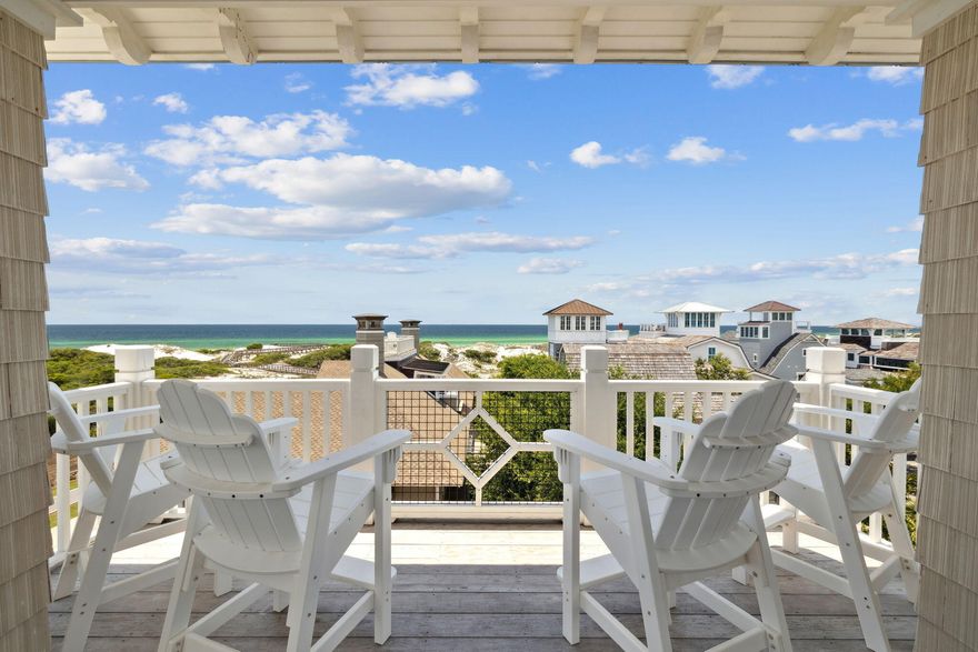 Ideally located in the gated community of WaterSound Beach, 85 S Founders Lane offers a blend of architectural character and thoughtful design, just a short distance from the Dunesider pool and boardwalks leading to the beach. Spanning more than 4,500 square feet across three levels, this six-bedroom, six-and-a-half-bathroom home is designed with comfort and functionality in mind.The first level features a secondary living area, three guest suites--including a custom bunk room--and access to a screened porch overlooking a peaceful outdoor setting. On the second floor, an open-concept layout connects the kitchen, dining, and living spaces, enhanced by exposed brick accents, wood beams,  and natural light from large windows.