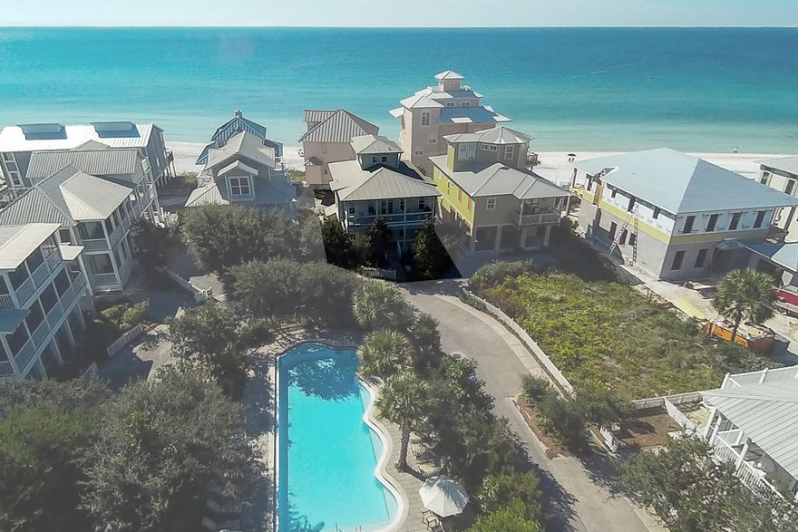 Deeded beach access is approximately 50 yards off the back porch of this 2nd row home with gulf views in Summer's Edge. Though in a popular vacation rental neighborhood, this home has never been rented, a fact reflected in its impeccable condition. Tasteful furnishings convey with its purchase, making it move-in and rental ready. Located south of Scenic Highway 30A, Summer's Edge features two pools, one of which is located across the street from this home. The gulf can be seen from the rear of its three floors, deep covered porches spanning the width of each. The 3rd floor tower room wet bar with sink, mini-fridge, wine cooler, and ice maker allows gatherings to be hosted on its covered balcony, where sunsets over the gulf during the fall and winter months can be best appreciated.