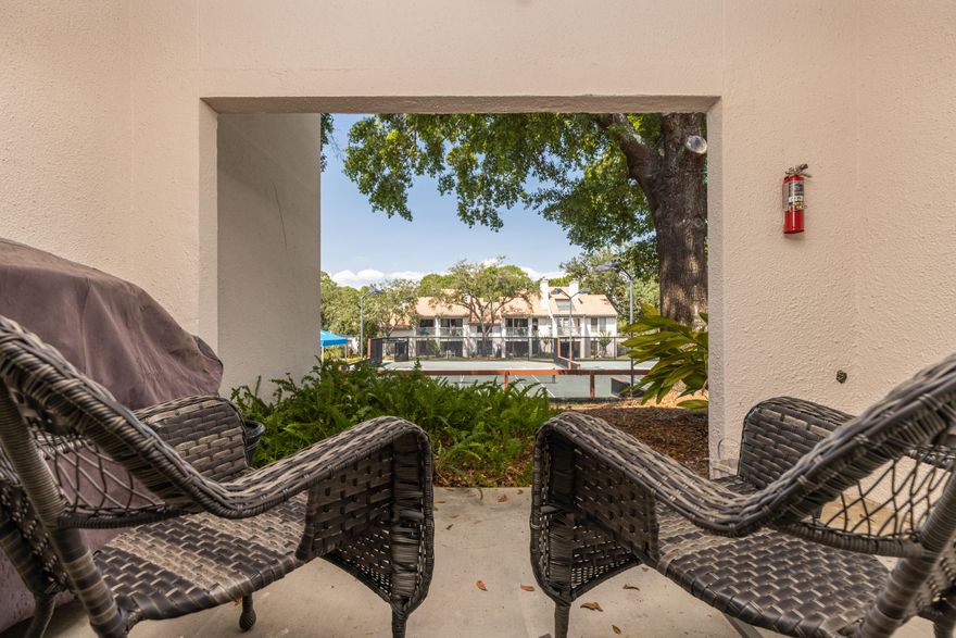 Location, Location, Location! This beautiful 2 bedroom, 2.5 bath property is located inside the gates of Tops'l Beach and Racquet club.