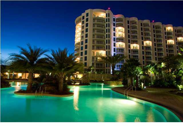 All the bells and whistles come with this rental, including lagoon pool, conference center, children's splash fountain, fabulous Sago Restaurant, playground, tennis courts, fitness center and so much more. Located across from Henderson State Park just yards from the beautiful Emerald Coast. Completely furnished, granite counter tops, high-end appliances and bay windows with unobstructed view. Very nice! No Pets.