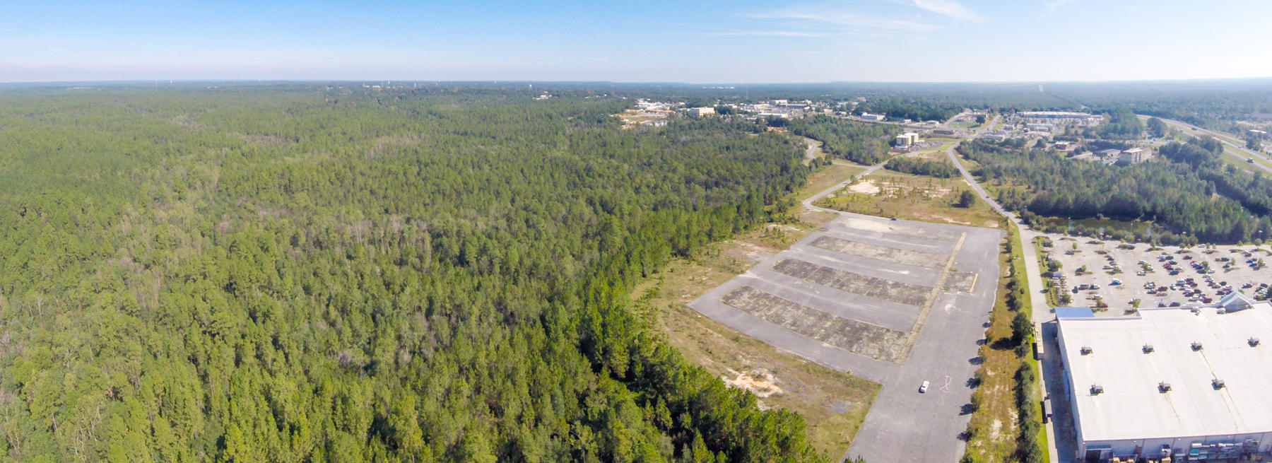 22.168+/- acre tract; a majority being located in the south and eastern central, interior portion of a large interior commercial tract, located behind the abutting parcels also a part of this tract, which are located along the west side of Highway 85, north of I-10 in Crestview, FL. The interior of the tract is located along the south side of W. Redstone Ave, south side of Physician's Dr (east end), east side of Price Gregory Wy, north side of Crosson St and the north side of Mirage Ave. I utilized the Okaloosa County Property Appraiser area and linear footage tool and was able to estimate the overall highway frontage approximating 942+/- feet. Parcel is sufficient to support a wide range of uses, based on it's indicated ''upland'' characteristics.