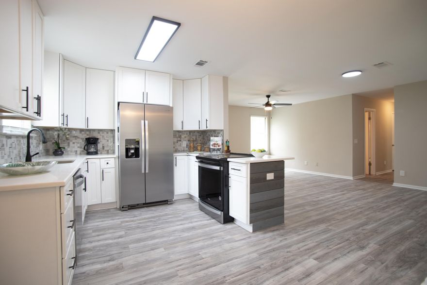 1.58 Acres -Completely updated Brick Home on 1.58 Acres! 3BD/2 BA in Laurel Hill. Completed Renovated. 2022 Roof/HVAC 2022. New Kitchen cabinets, New Appliances, Backsplash, flooring & Lights. New Paint inside and out. New Laminate flooring in main areas, new luxury vinyl in baths and carpet in bedrooms. New fans/lights throughout home. Bathrooms updated with new vanities, lights, mirrors, etc. Make your appointment today!