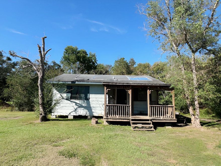 Resting on just under 1/2 acre, this 2 bedroom 1 bath REO cottage may be that diamond in the rough you've been looking for.  Offering the solitude of country living, this home was built in 1990 and is right at 800 sf.  Let your imagination take offer to turn this opportunity into a home. Home will not qualify for all financing.