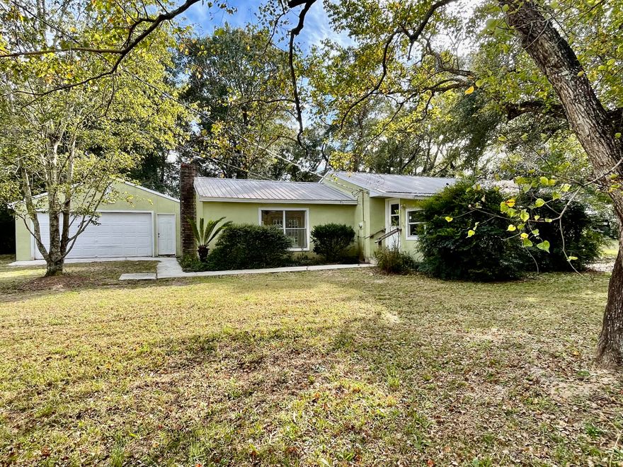 Nestled in the country and waiting for you, this REO home is a must see to appreciate! This 3 bedroom 2 bath 1312 square foot home rests on just over 3/4 acres of an acre and though built in 1956, this one feels newer than you think. Home has detached 2 car garage work shop, completely fenced property and located at the end of the street so no through traffic here. Several upgrades have been made over the years including metal roof, large open living room with large brick fireplace, and in-ground pool. Some elbow grease will go far with this one so call today!