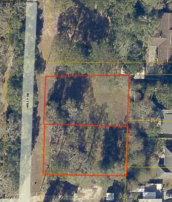 Gorgeous 1/2 Acre off Bud Moulton Road is ready for you to build your dream home! Level lot in North Crestview on a quiet street of Holly Drive in the Holly Hills Subdivision has mature trees on the border of the property lines with the center of the property cleared and maintained. Two parcel ids: 284N23284000030150 & 284N23284000030160. Build 1 or 2 homes!